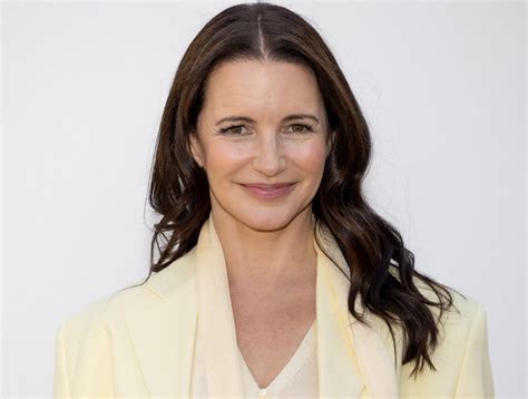 Kristin Davis slowly removes her top and smiles (Sex And The City)